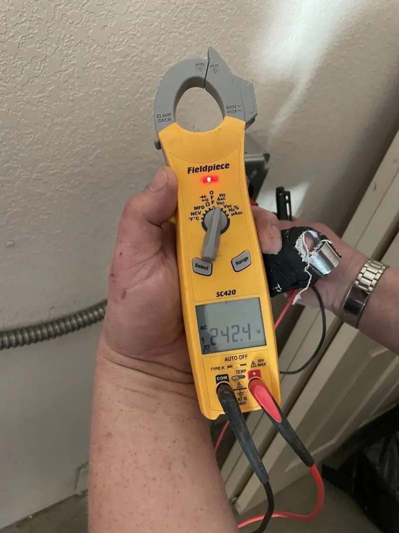 Voltage testing with clamp meter during Generator Installation in South Gate Ridge